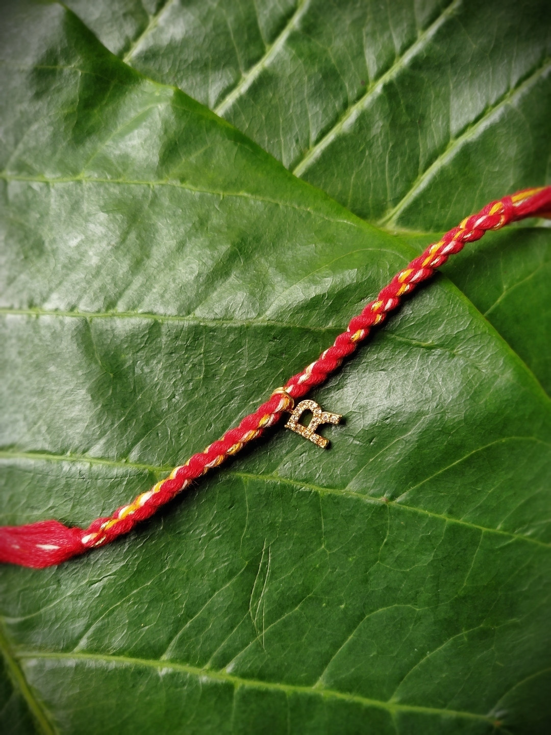 Digital Dress Room Men Gold-Plated Red & Yellow AD-Studded R Alphabet Customized Thread Rakhi