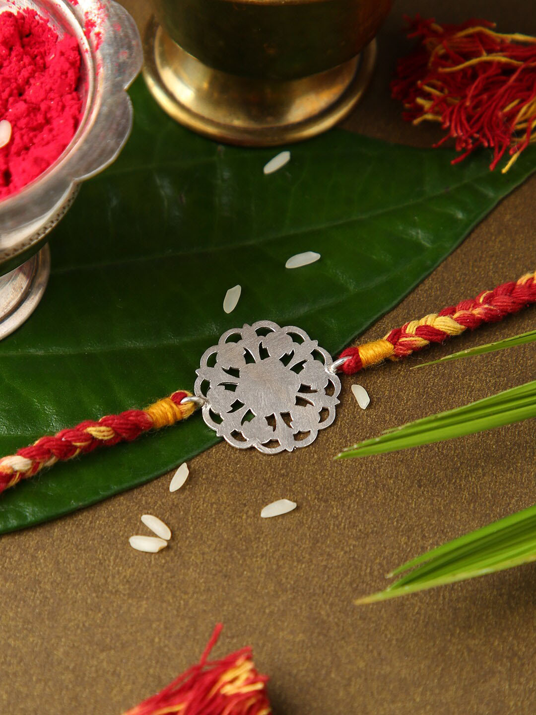 justpeachy Silver-Toned & Red Rakhi with Roli & Akshada