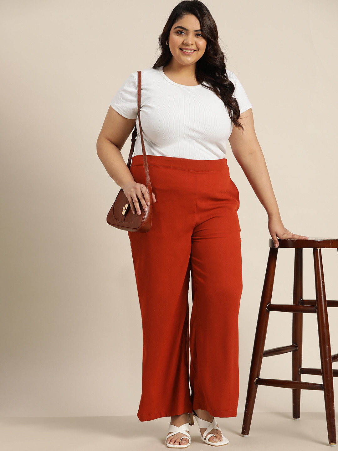 Sztori Women Plus Size Rust Orange Solid Parallel Trousers