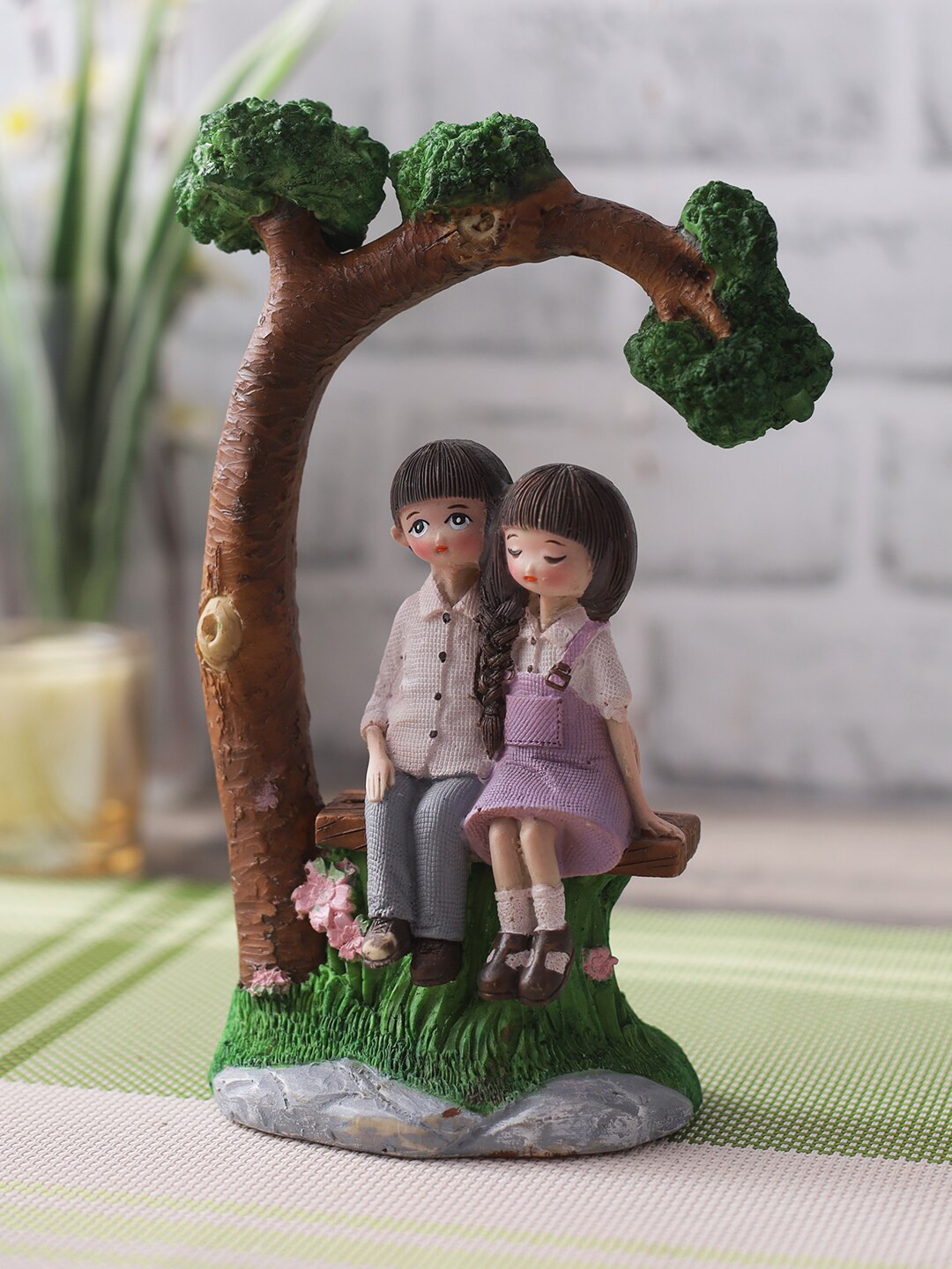 CraftVatika Romantic Love Couple Sitting on Bench Green Resin Matte Living Room Small Showpiece - 8 Inches