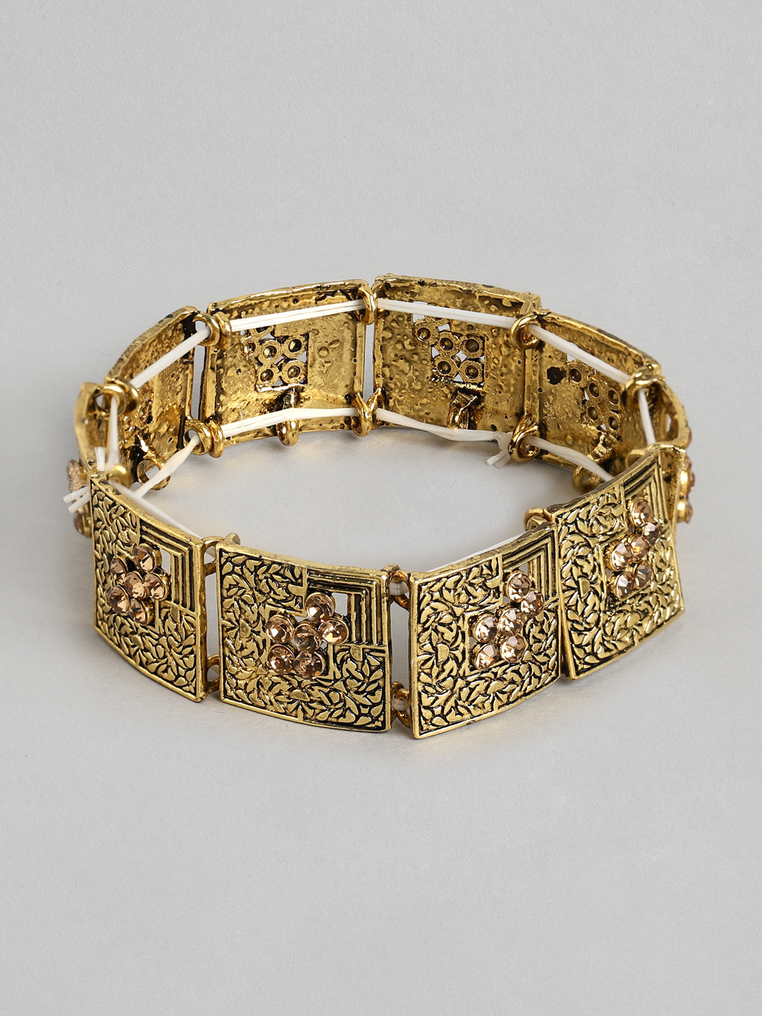 Kord Store Women Antique Gold-Plated Stone-Studded Textured Elasticated Bracelet