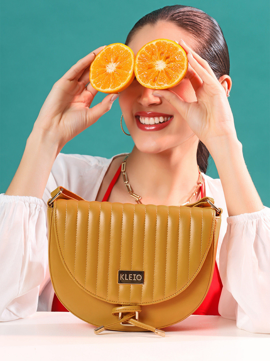 KLEIO Quilted Half Moon Sling Bag