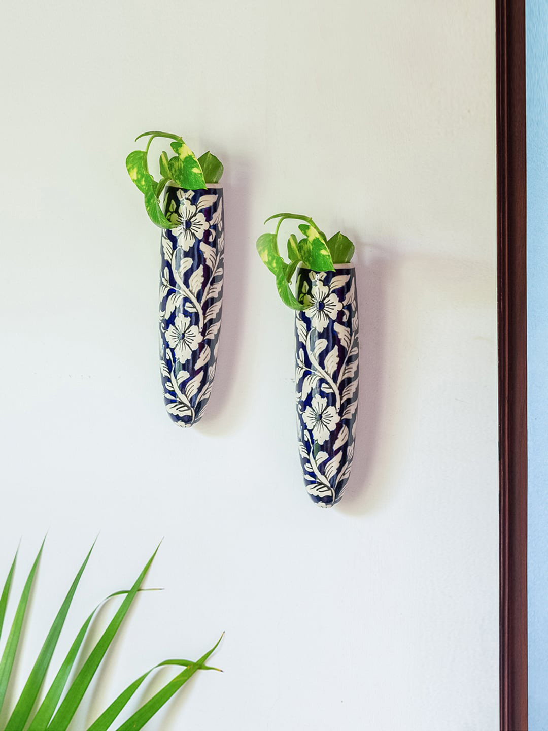 ExclusiveLane Blue & White 2 Pieces Floral Ceramic Wall Planters