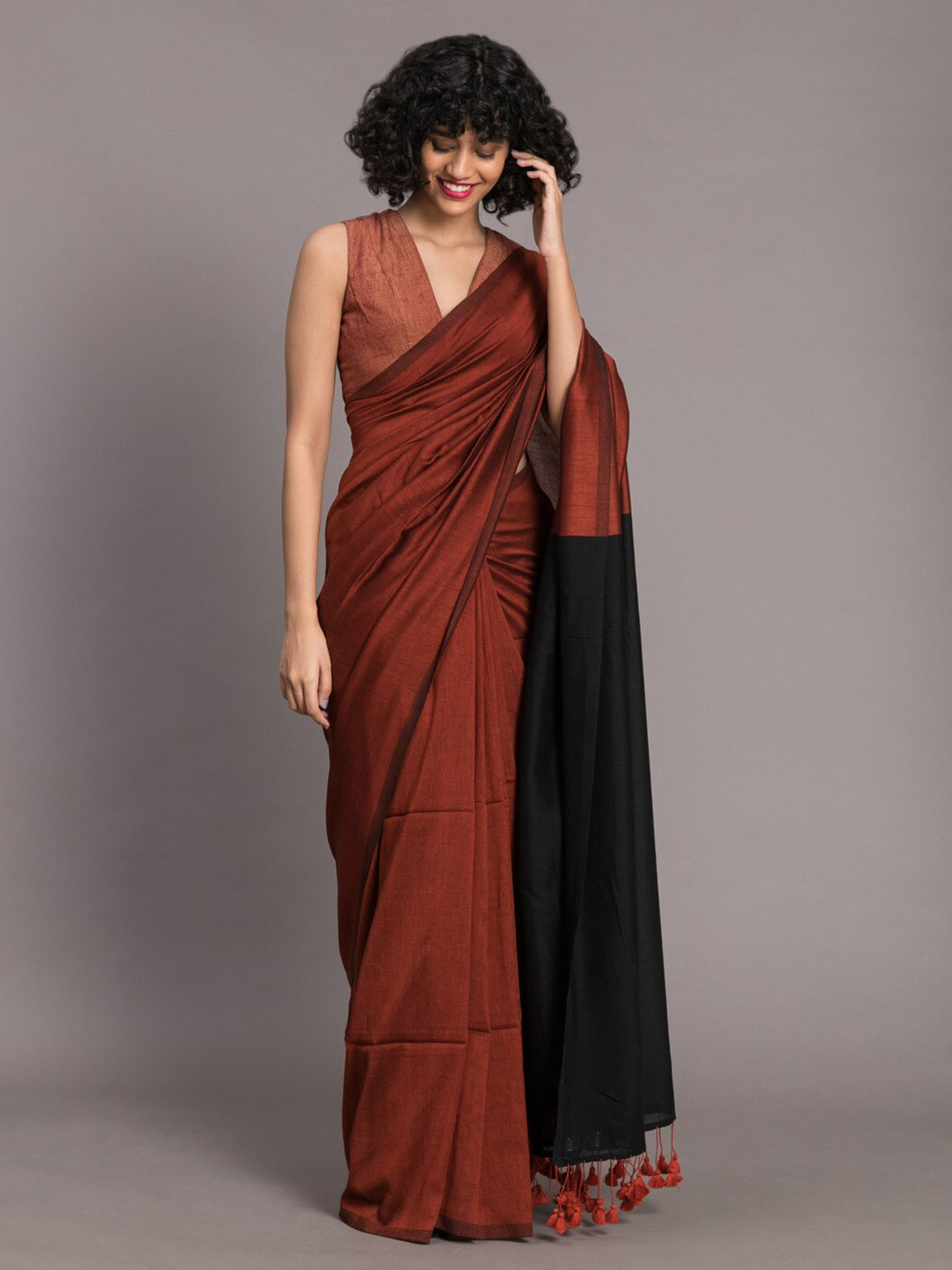 Suta Rust Brown & Black Colourblocked Saree