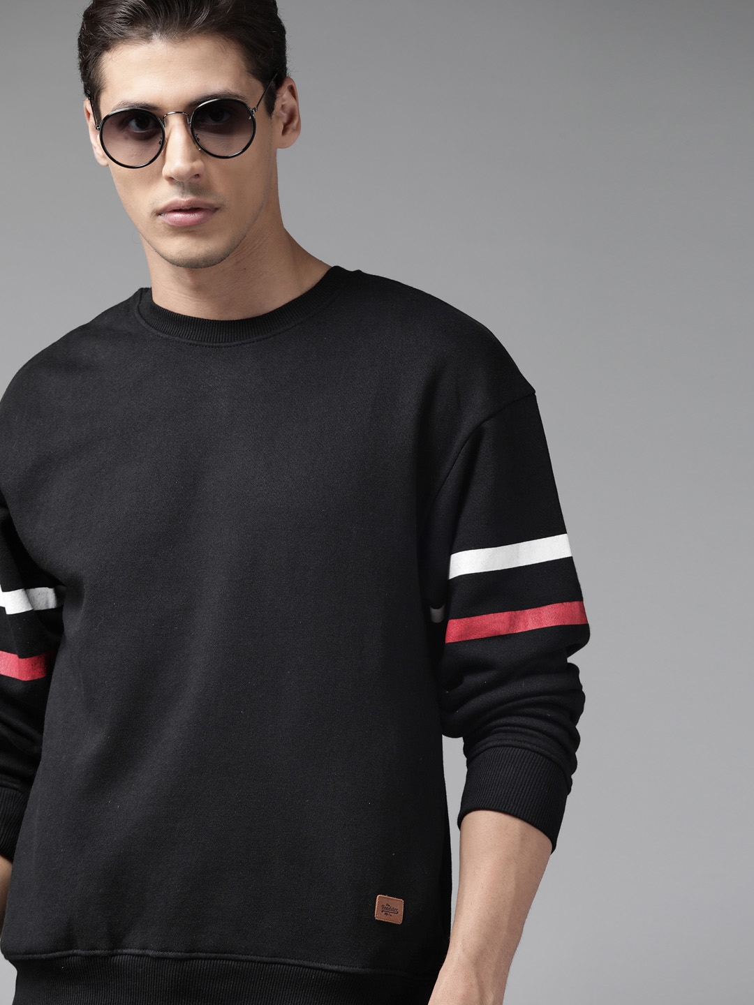 Roadster Men Black Solid Sweatshirt with Striped Sleeves