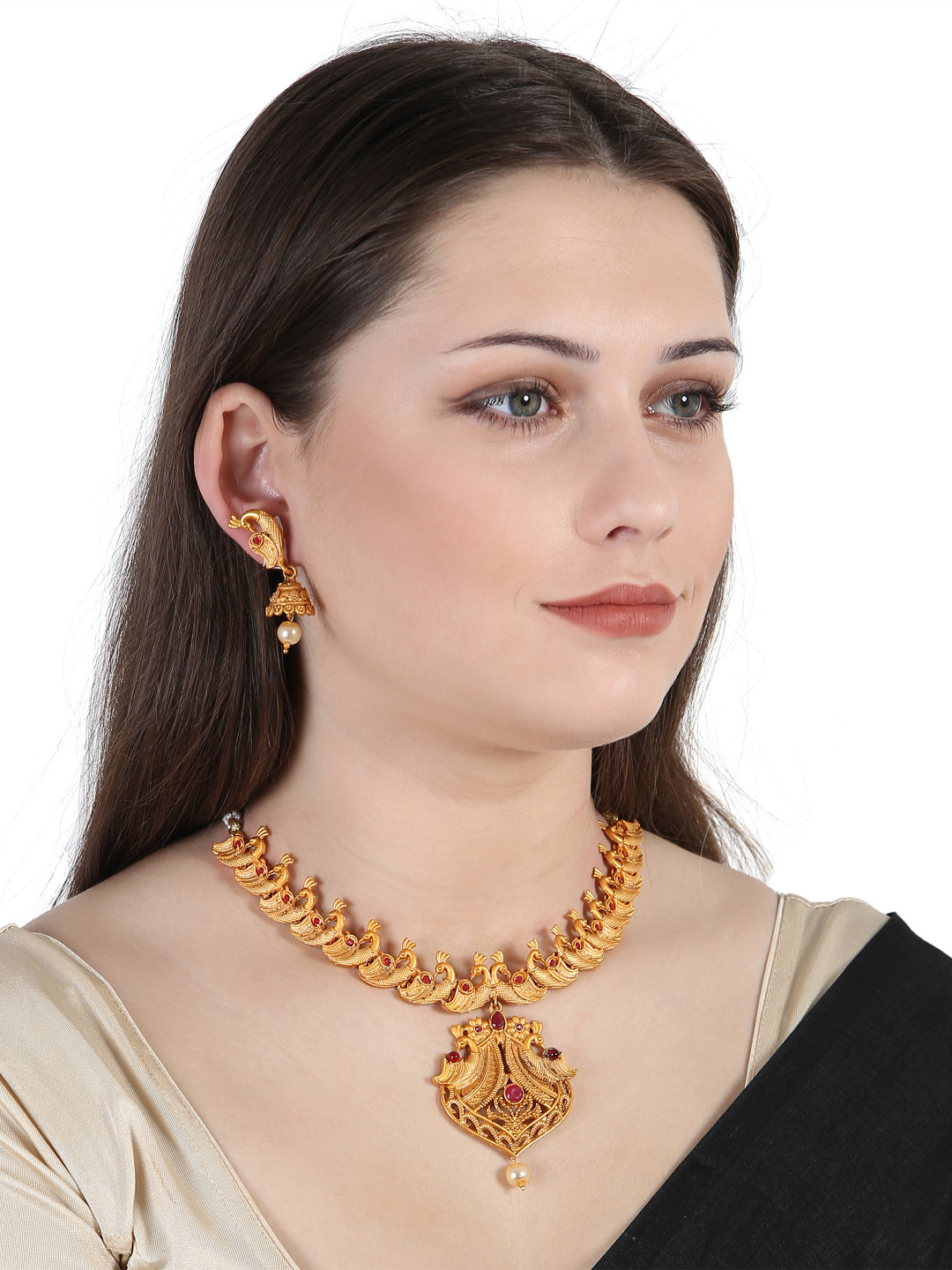 ANIKAS CREATION Gold Plated Red Stone Studded Jewellery Set