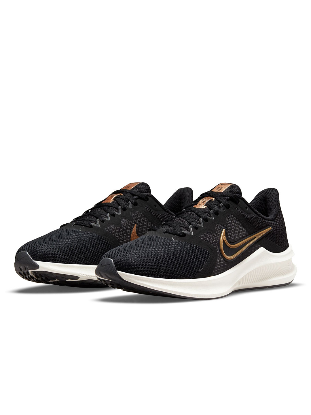 black and gold nike running shoes