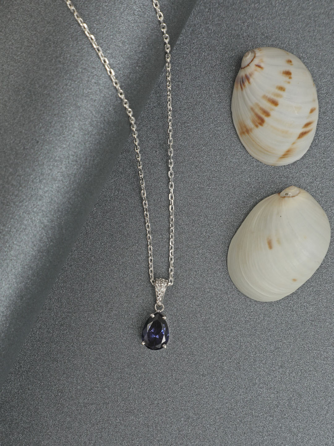 CLARA 92.5 Sterling Silver Rhodium-Plated Swiss Blue Teardrop Pendant with Chain