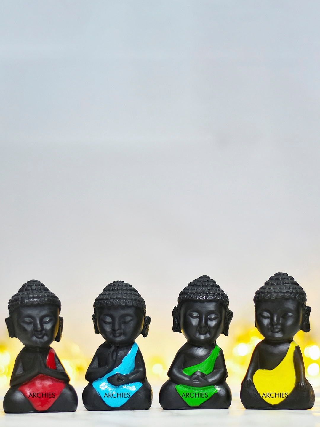 Archies Black Set of 4 Mini Buddha Monks Showpiece