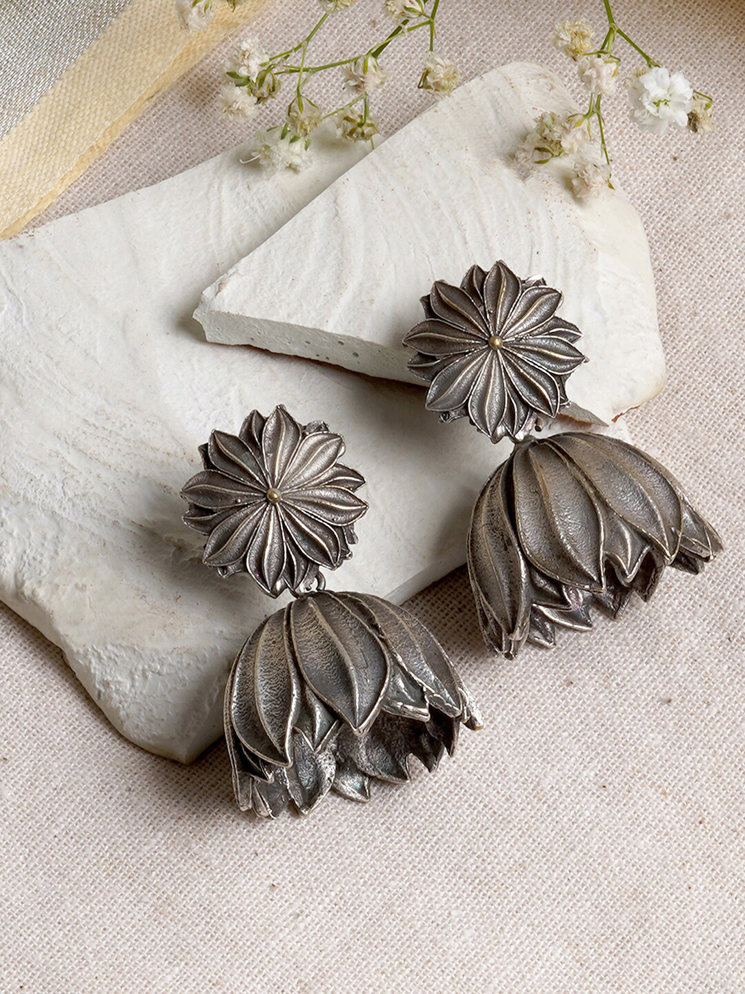 TEEJH Oxidised Vasana Silver-Plated Floral Jhumkas