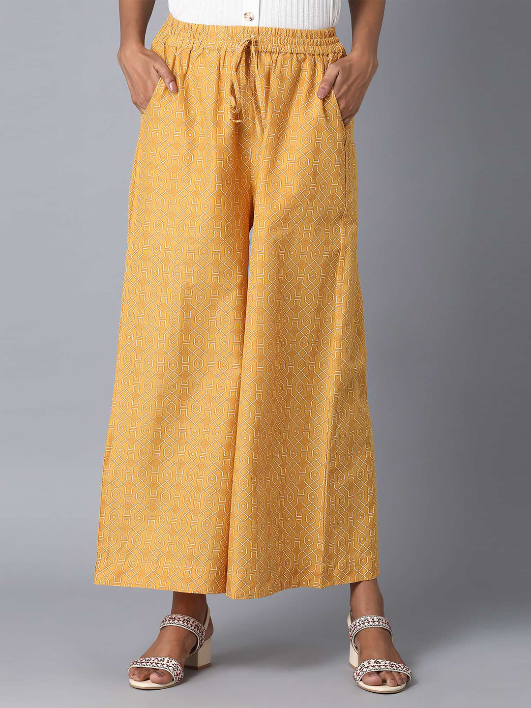 elleven Women Yellow Printed Palazzos