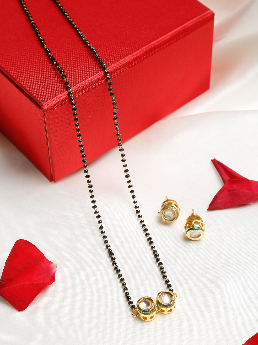 Ruby Raang Black & Gold-toned Kundan Mangalsutra with Studs