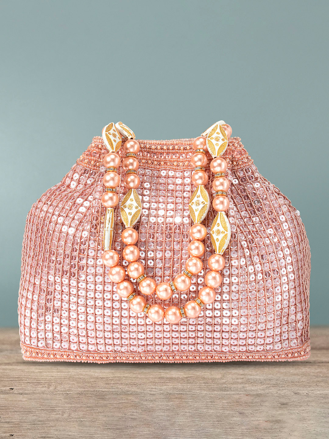 Peora Rose Gold Embellished Potli Clutch