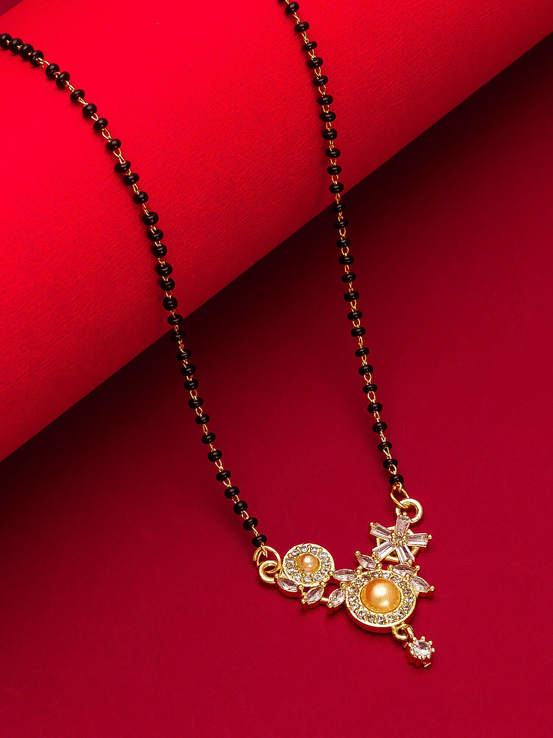 aadita Woman Gold-Plated White Stone & Black Beaded Mangalsutra