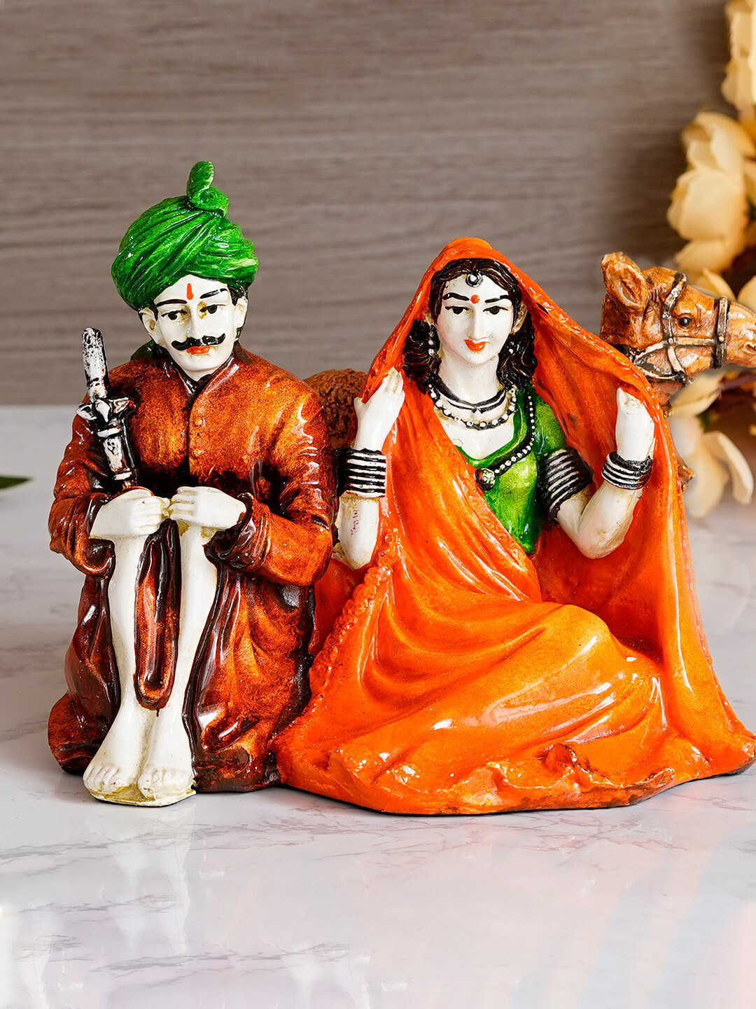 eCraftIndia Sitting Rajasthani Couple Green Polyresin Glossy Living Room Hand-Crafted Large Showpiece - 6.3 Inches