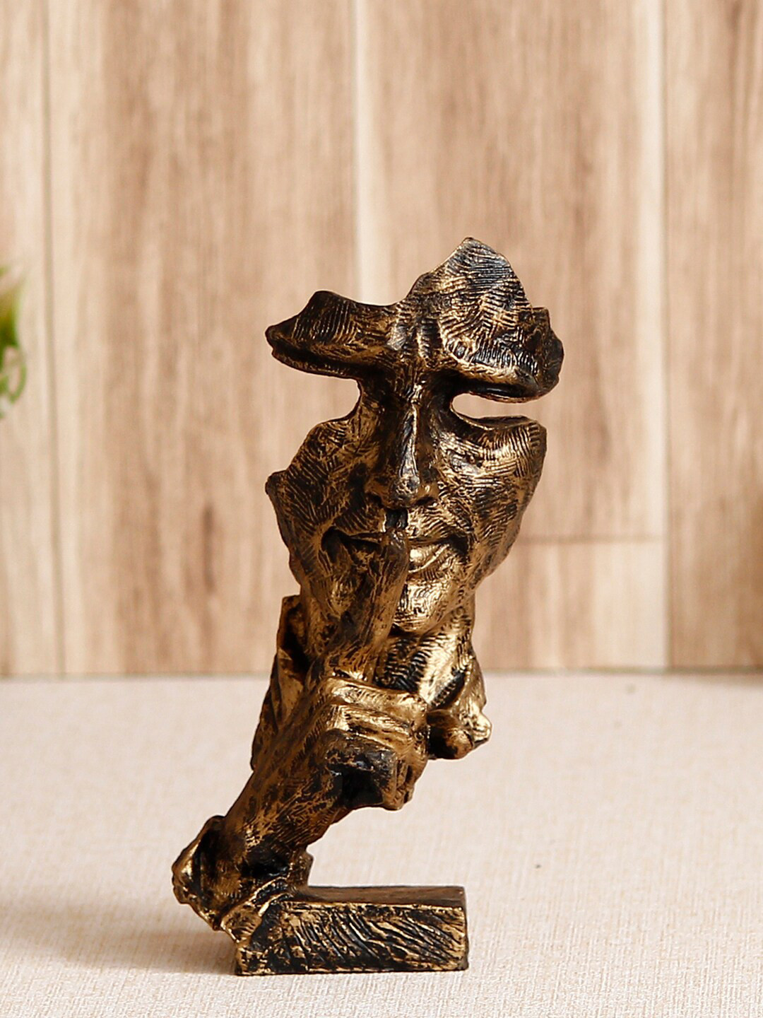 eCraftIndia Finger On Man Lips Gold Polyresin Natural Living Room Hand-Crafted Large Showpiece - 6.3 Inches