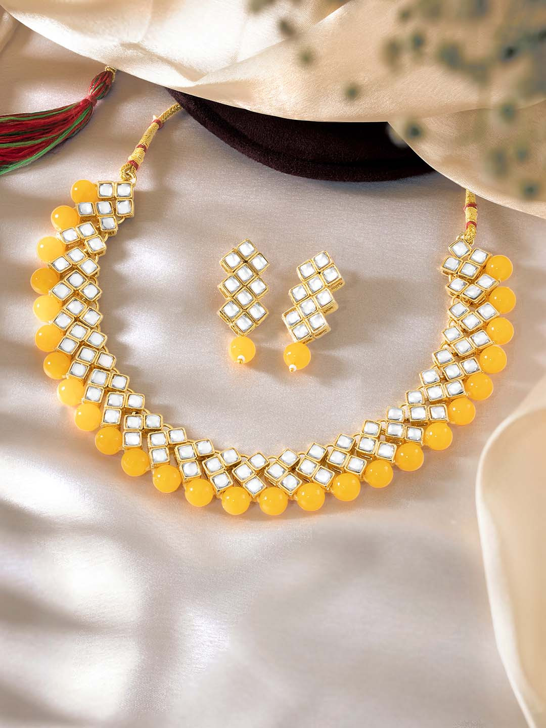 Peora Yellow & White Gold-Plated Kundan Pearl Jewellery Set
