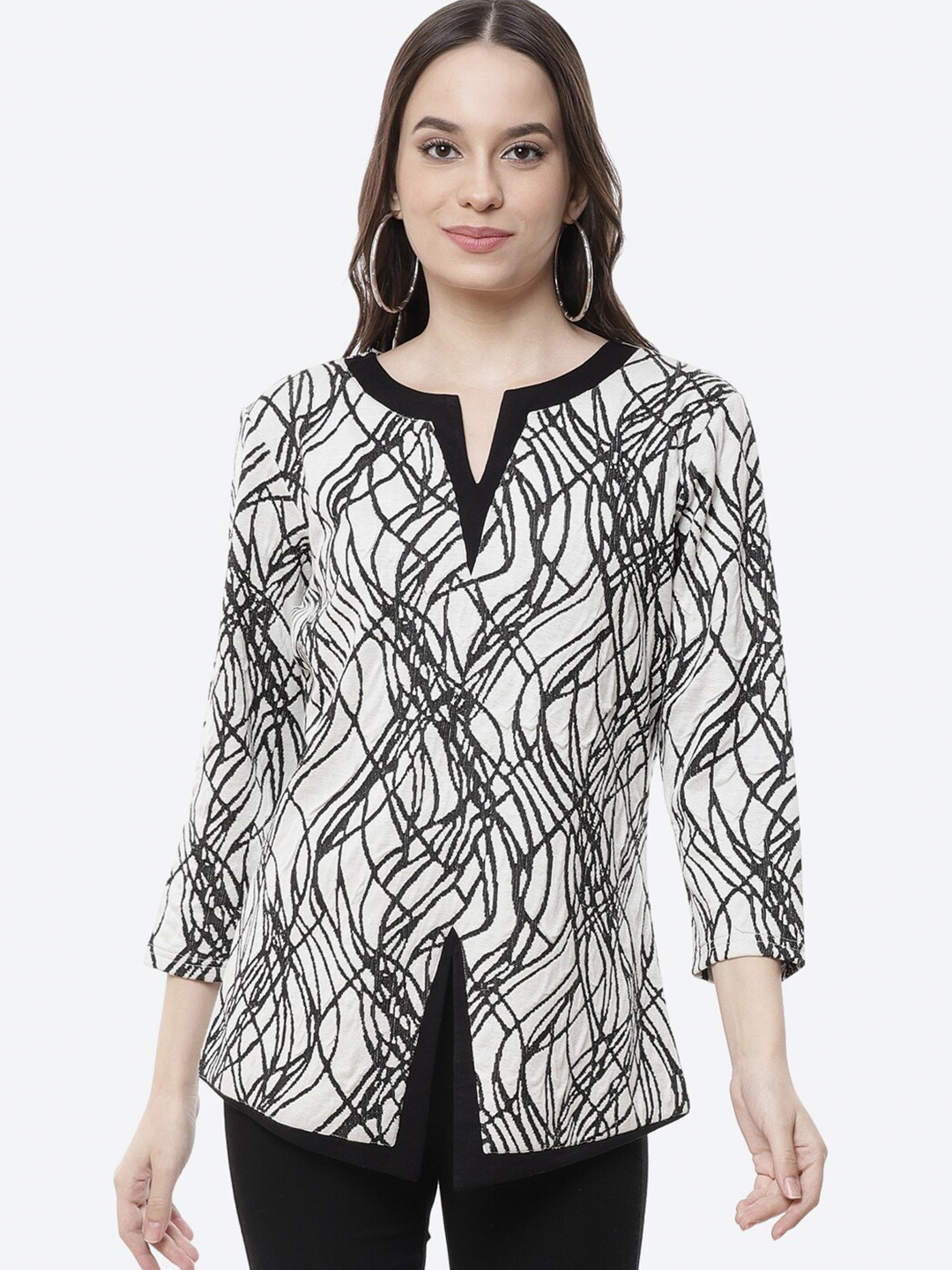 Kurti's by Menka White Animal Regular Top