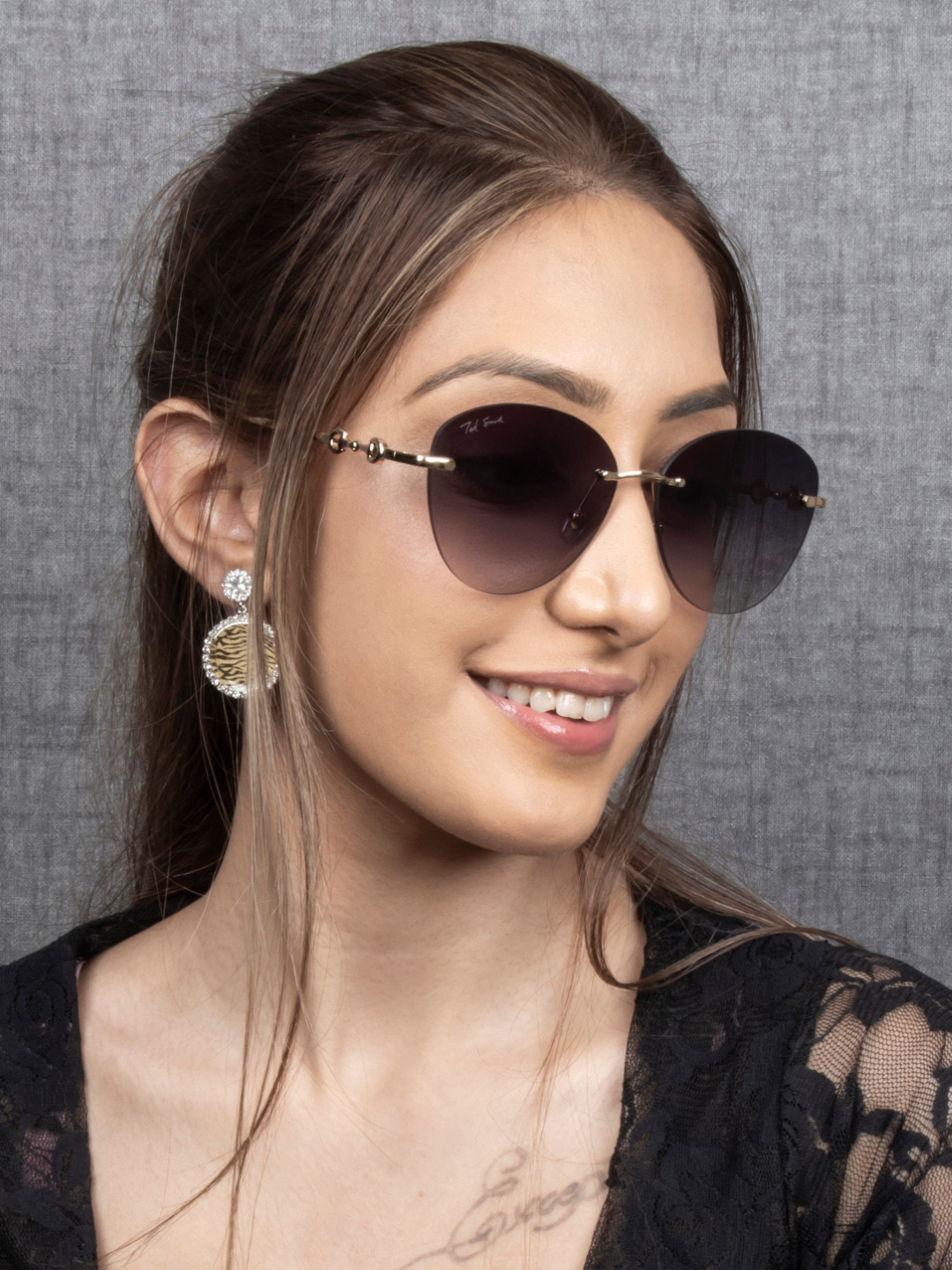 Ted Smith Women Gold-Black Rimless Cat-Eye Sunglasses With UV Protected Lens