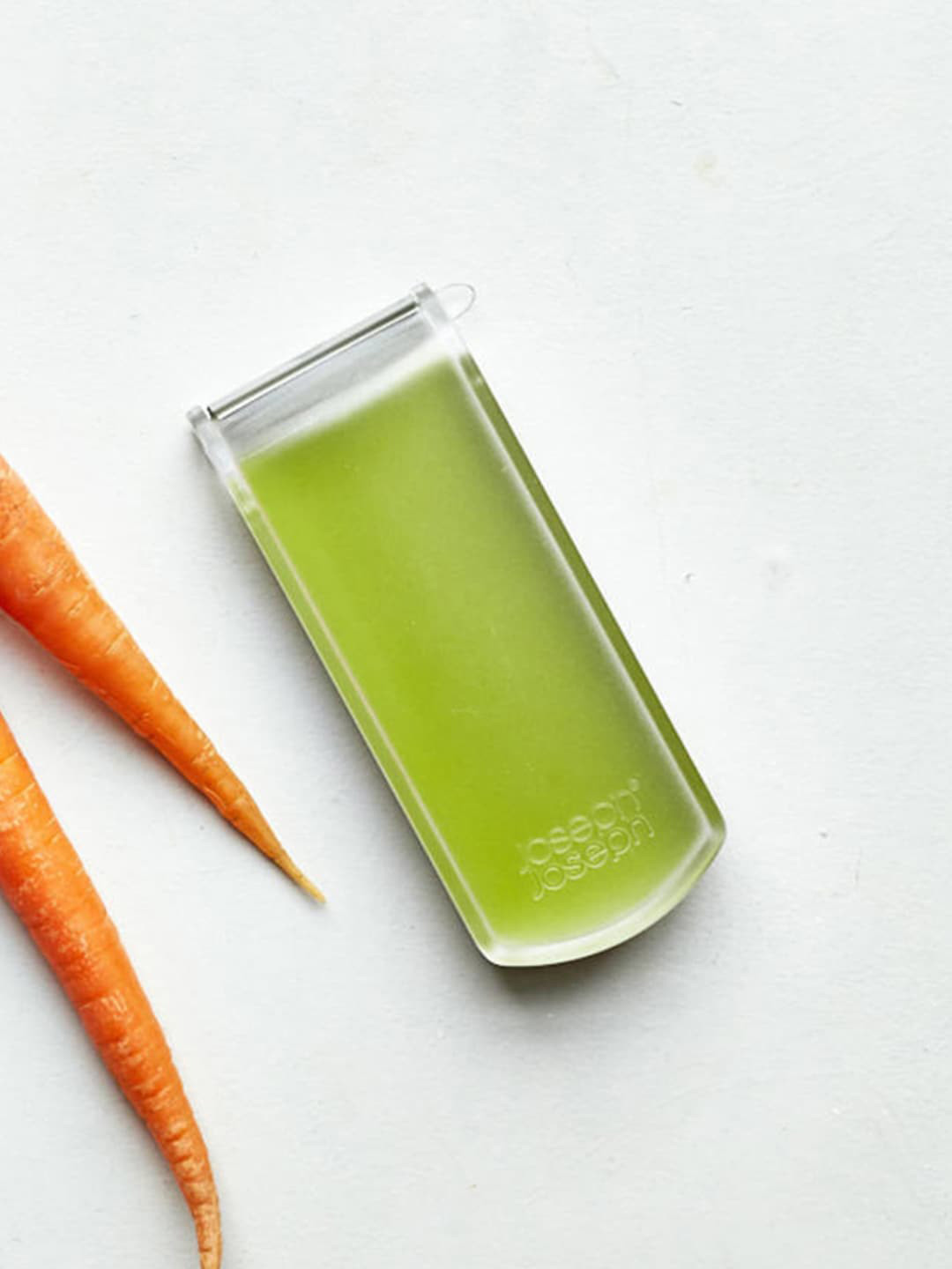 Joseph Joseph Green & Transparent Solid Stainless Steel Waste Collecting Peeler