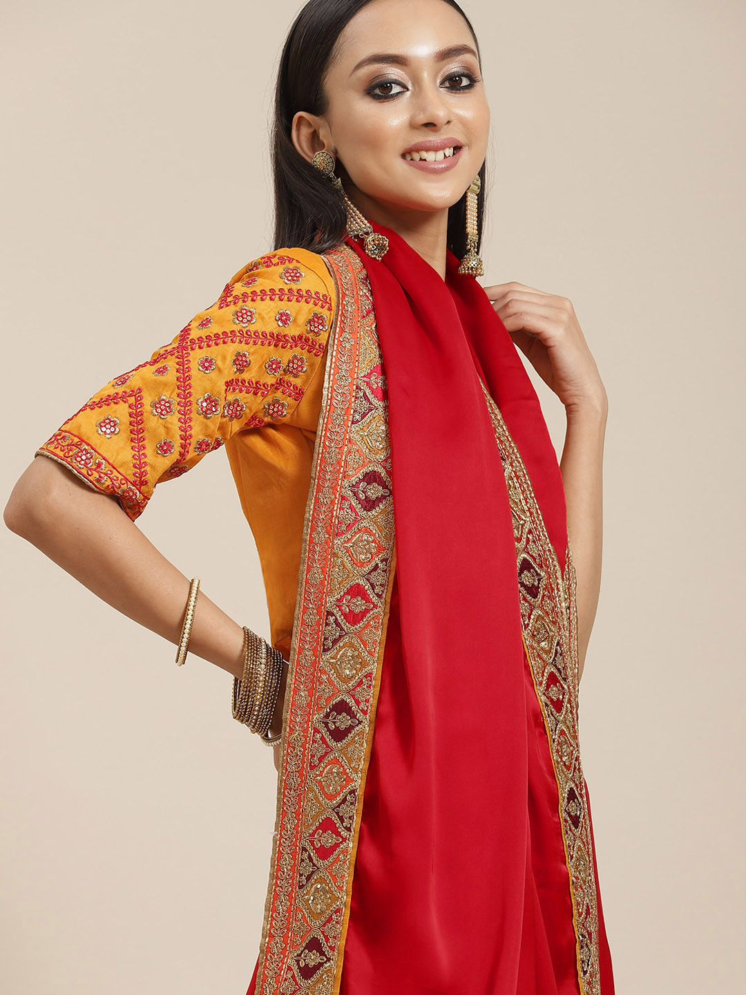 Mitera Red & Golden Solid Saree