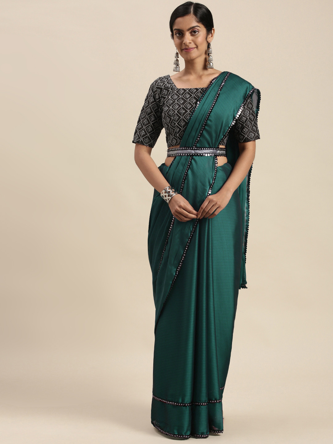 Mitera Teal Green Sequinned Border Saree