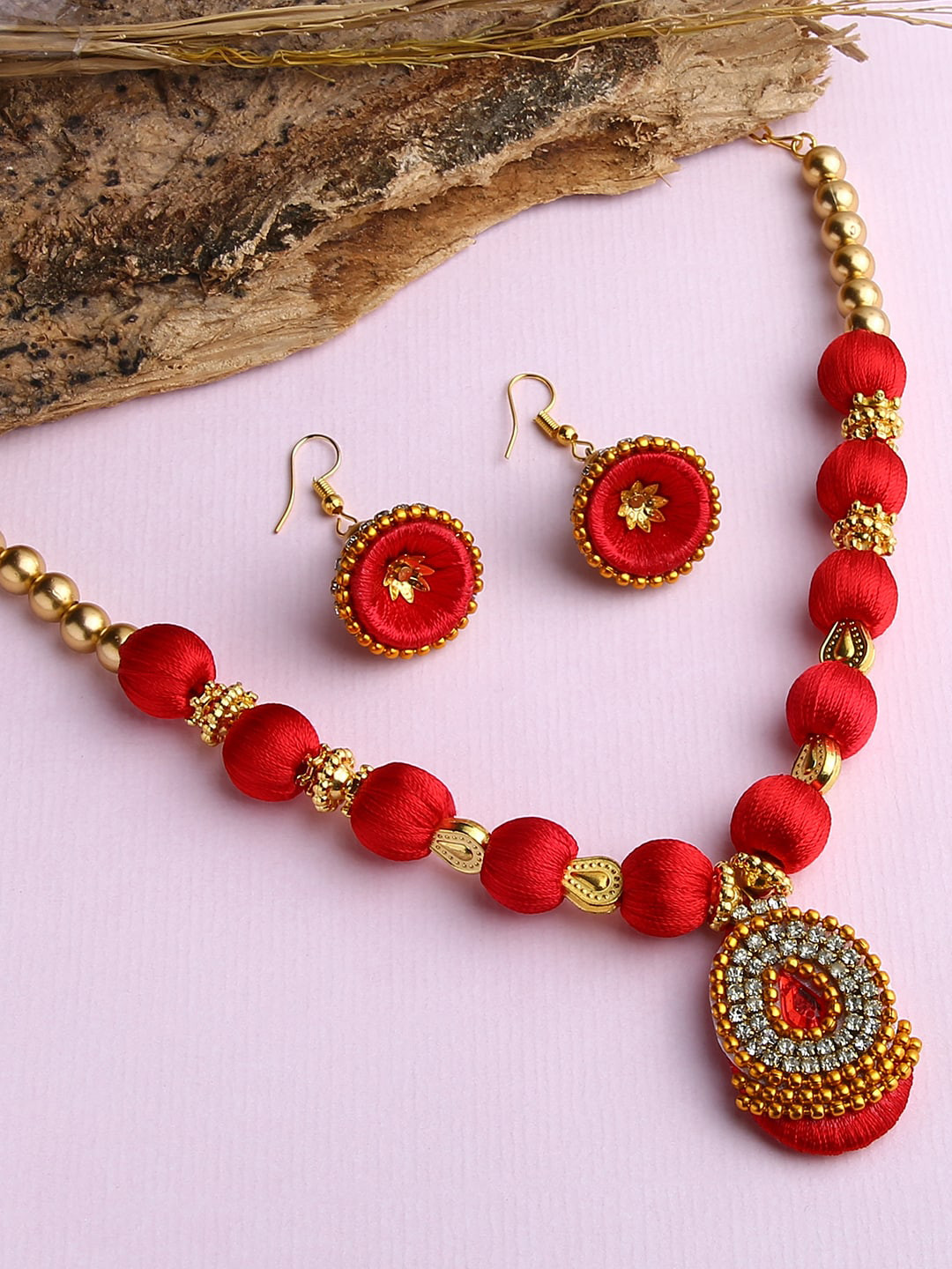 AKSHARA Gold-Plated & Red Stone-Studded Red Wooden Balls Silk Thread Jewellery Set