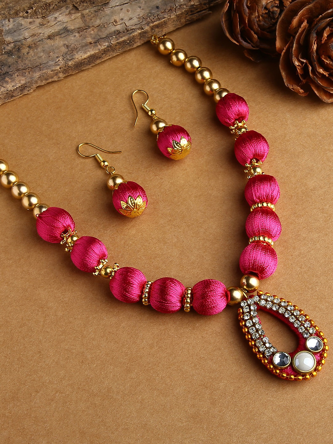 AKSHARA Gold-Plated & Pink Stones-Studded & Beaded Balls Silk Thread Jewellery Set