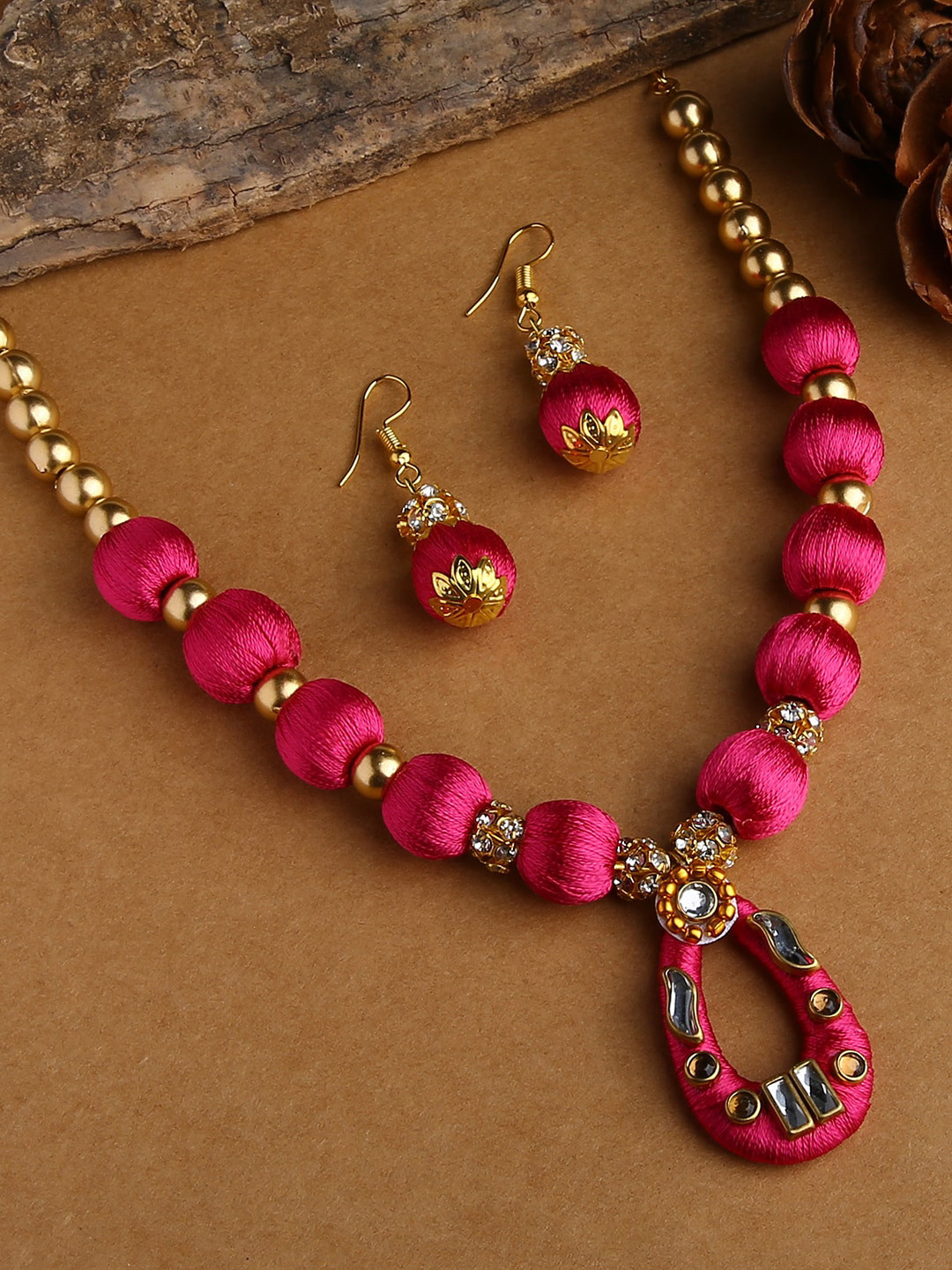 AKSHARA Women Pink Stone-Studded Balls Silk Thread Jewelry Set
