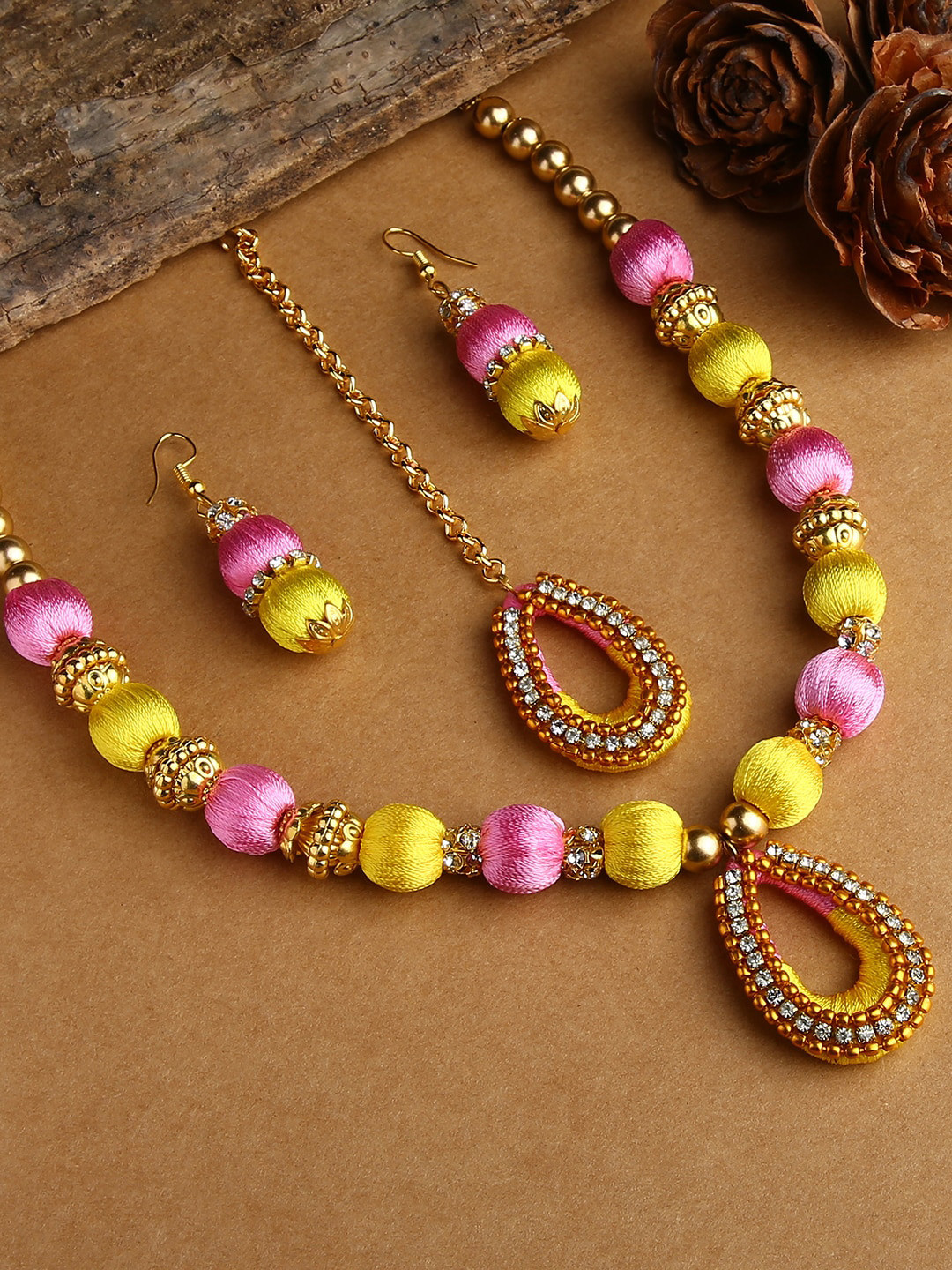 AKSHARA Gold-Plated Yellow & Rose-Pink Stones-Studded & Beaded Wooden Balls Silk Thread Jewellery Set