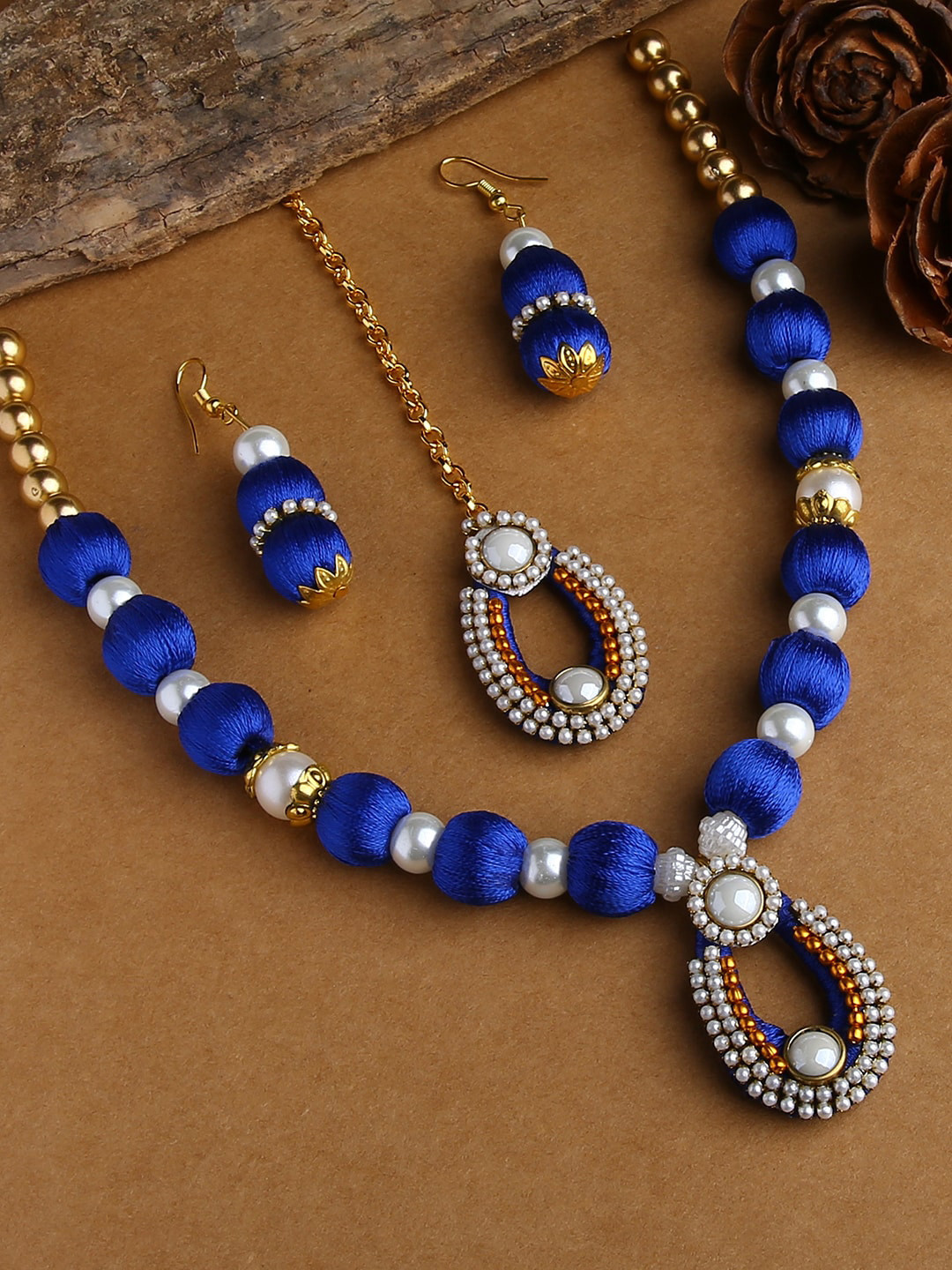 AKSHARA Gold-Plated White & Blue Stones-Studded & Pearl Beaded Wooden Balls Silk Thread Jewellery Set