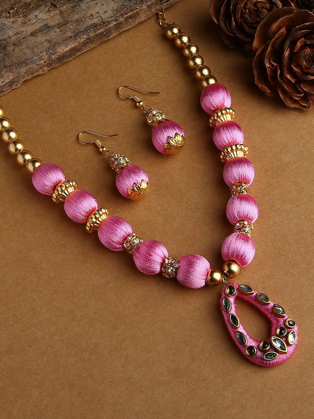 AKSHARA Gold-Plated White & Rose-Pink Stone-Studded & Beaded Wooden Balls Silk Thread Jewellery Set