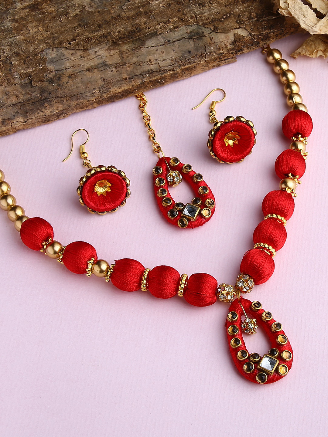 AKSHARA Gold-Toned White & Red Stone-Studded Wooden Balls Silk Thread Jewellery Set