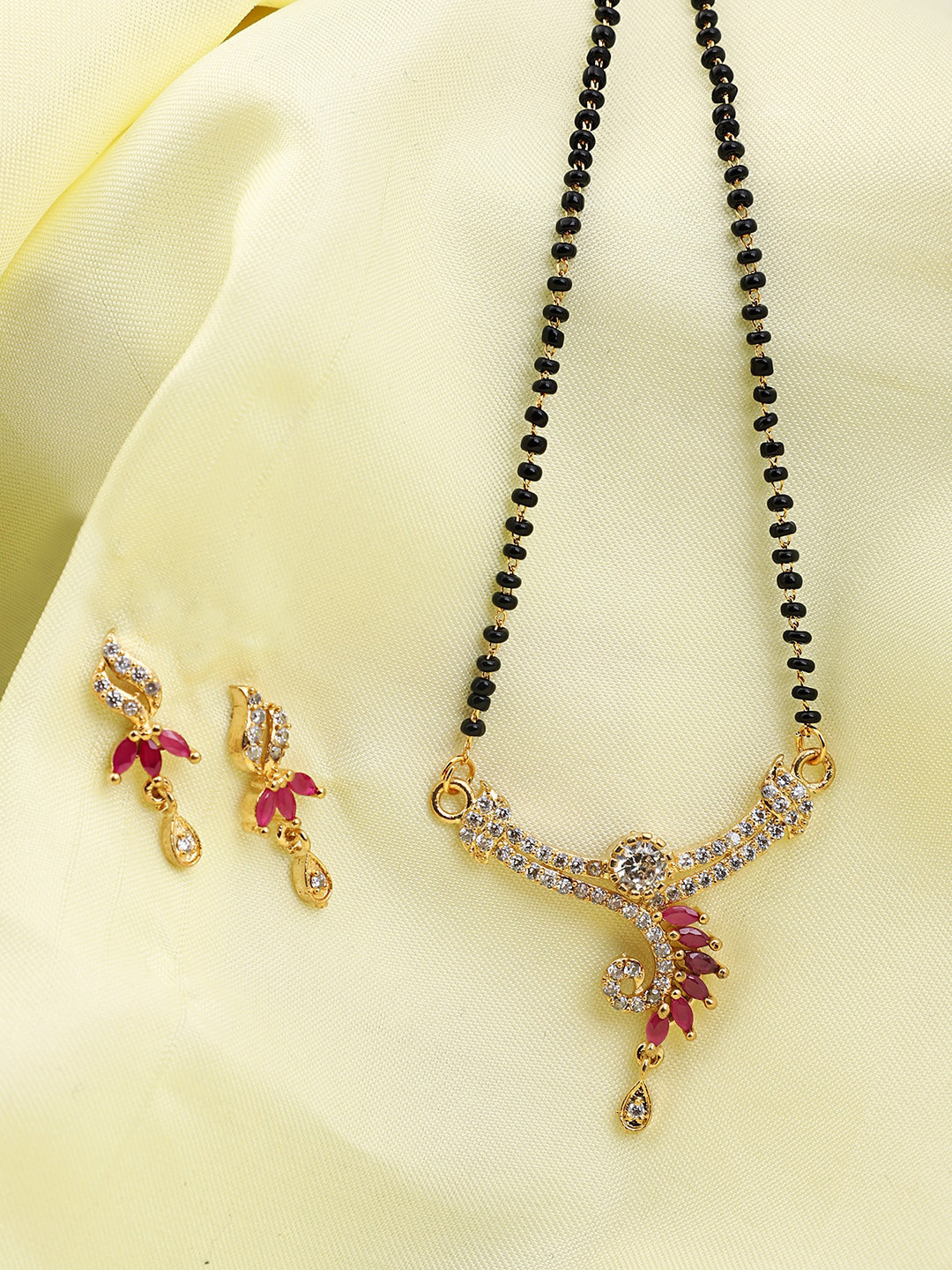 ANIKAS CREATION Gold-Plated Black & White Stone-Studded & Beaded Mangalsutra With Earrings