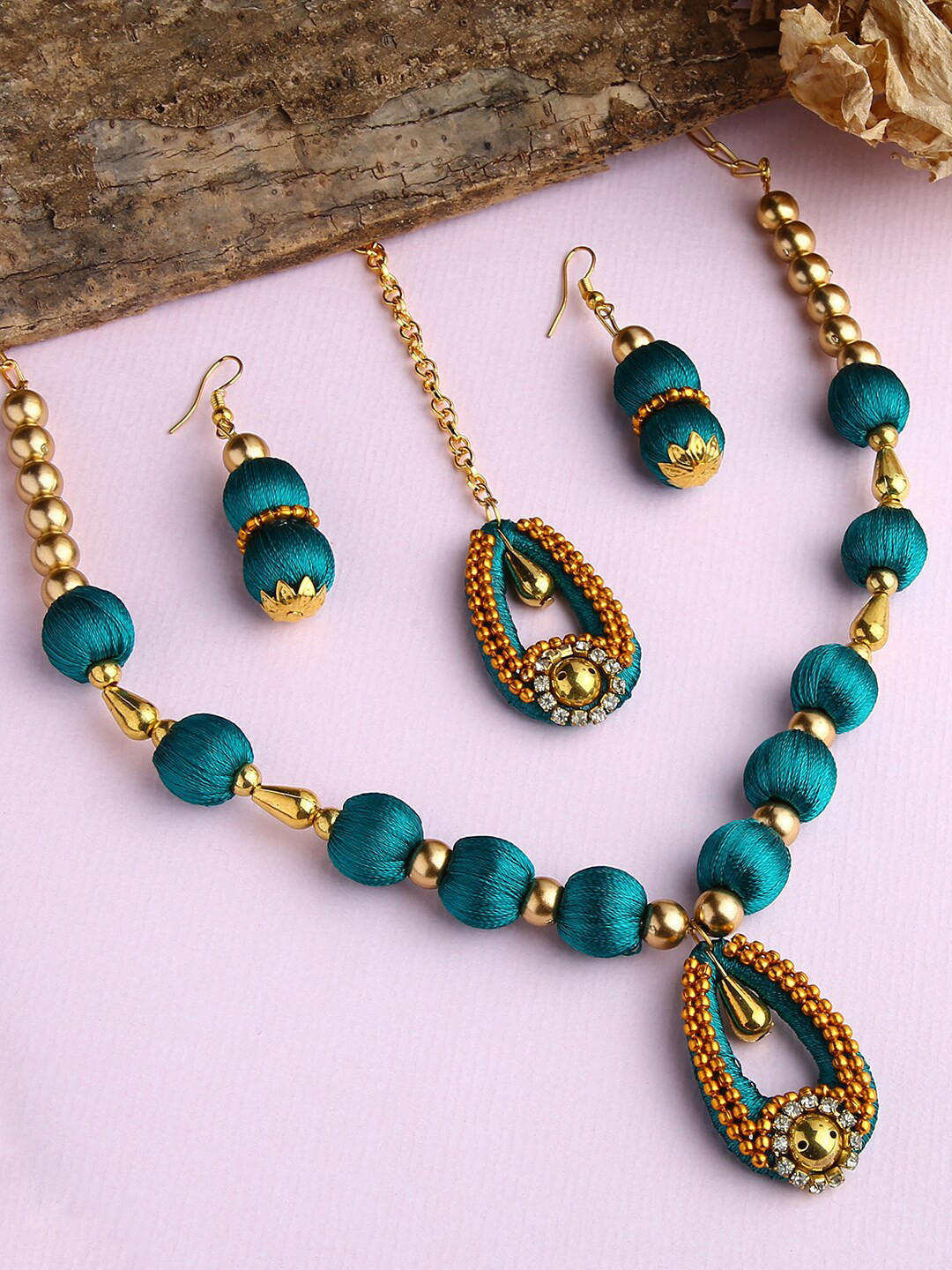AKSHARA Gold-Plated Green Stone-Studded Blue Wooden Balls Silk Thread Jewellery Set