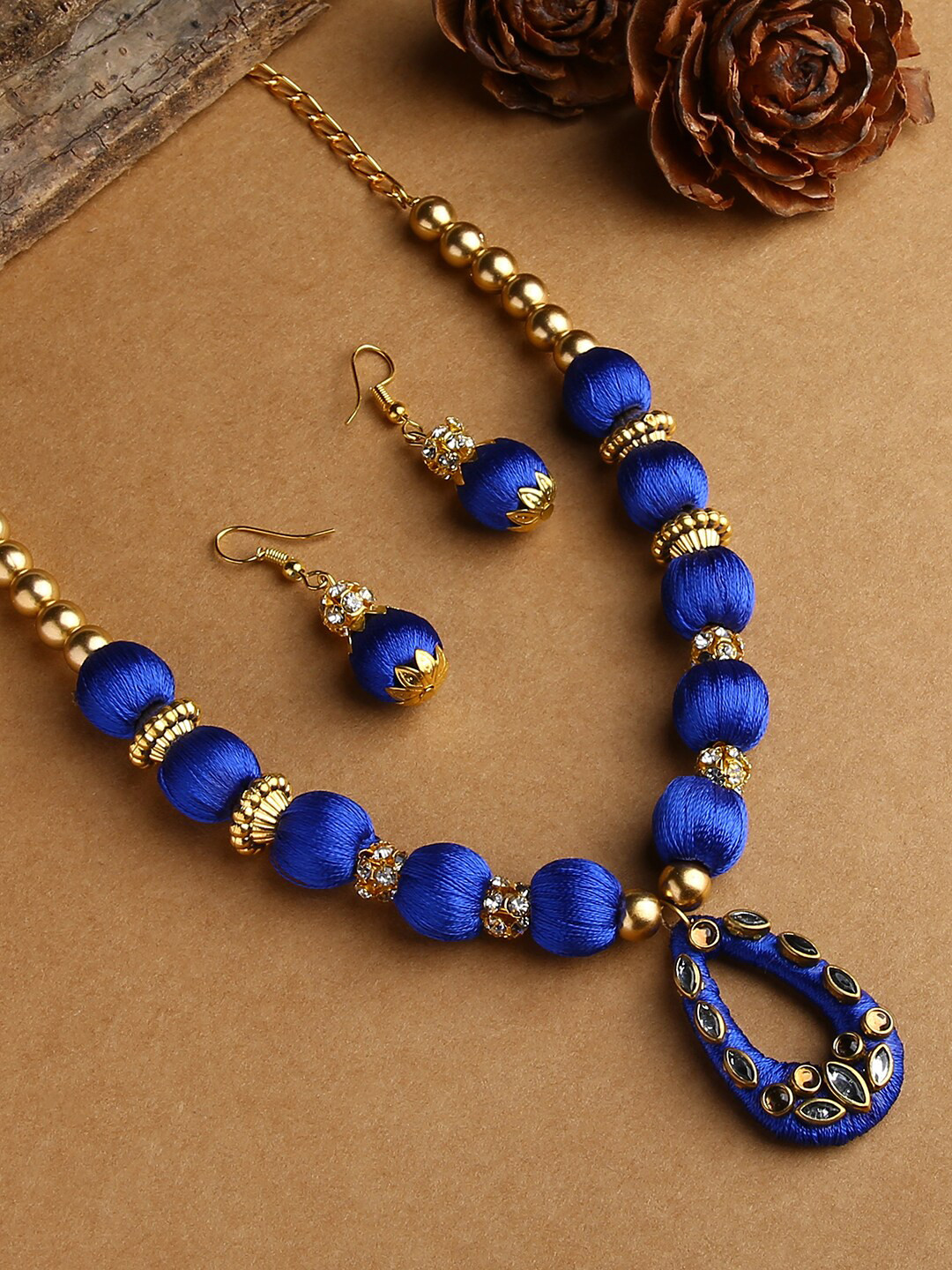 AKSHARA Girls Gold-Plated & Blue Stone-Studded & Beaded Thread Jewellery Set