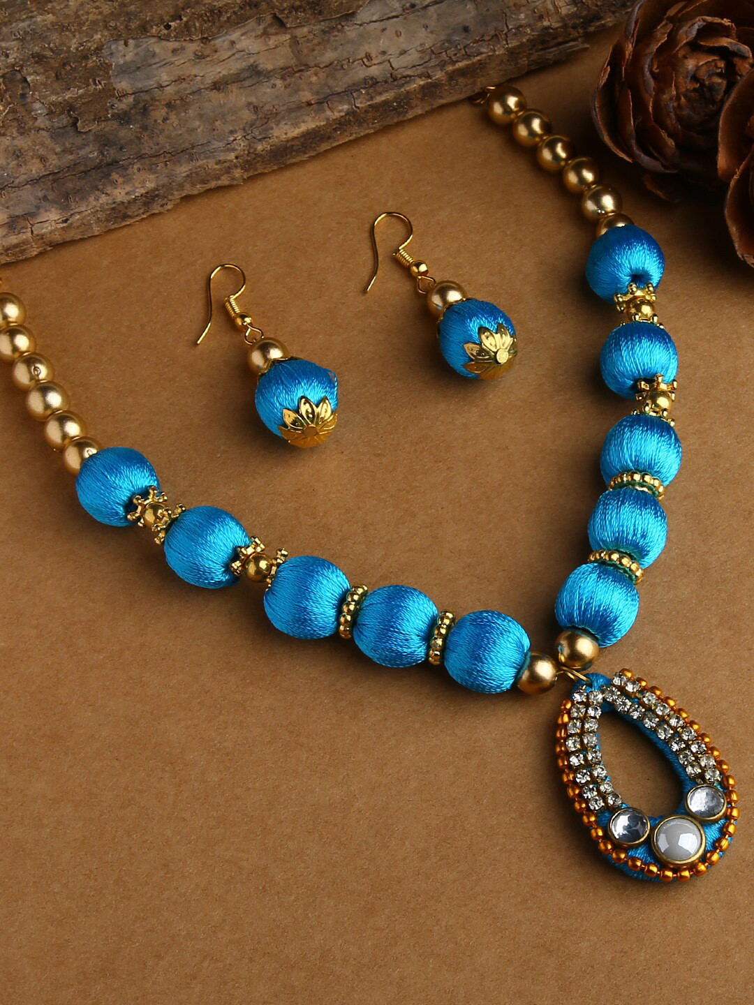 AKSHARA  Gold-Plated White & Blue Stone-Studded Thread Jewellery Set
