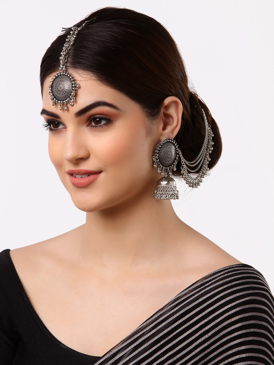 Arrabi Metallic Oxidised Kundan Studded Maang Tika & Earrings Set