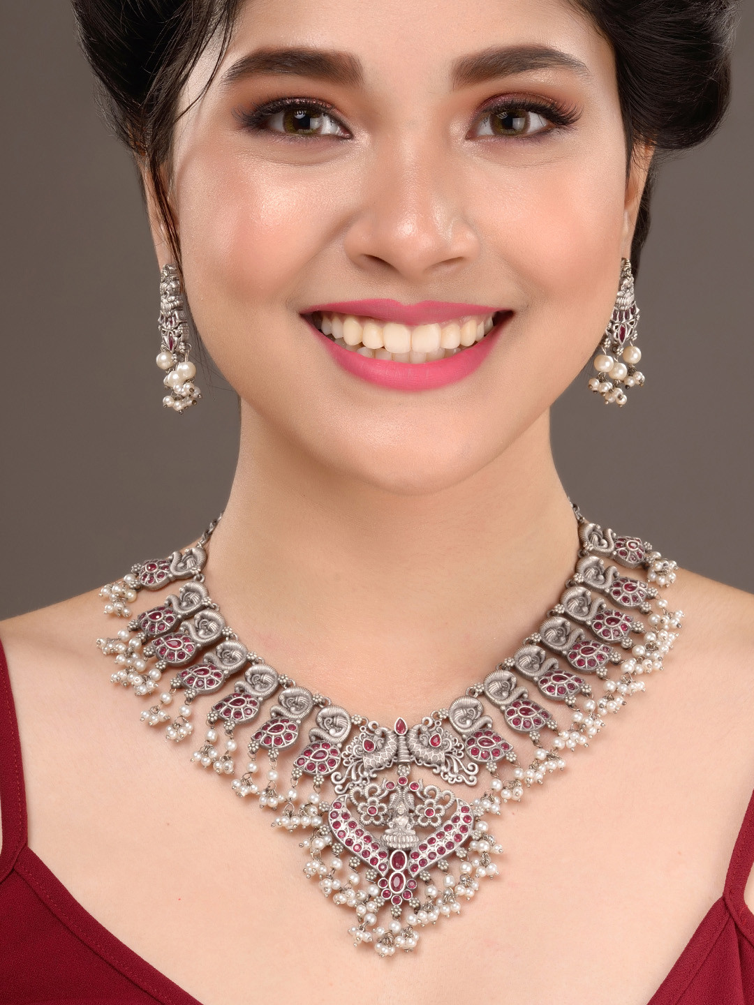 Saraf RS Jewellery Oxidised Silver-Toned & Red Stone-Studded Peacock Design Jewellery set