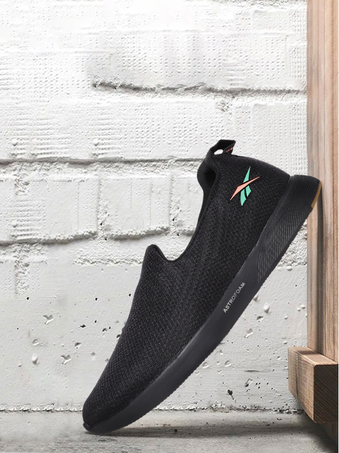 Reebok Men Black Woven Design Out Bound Slip On Walking Shoes