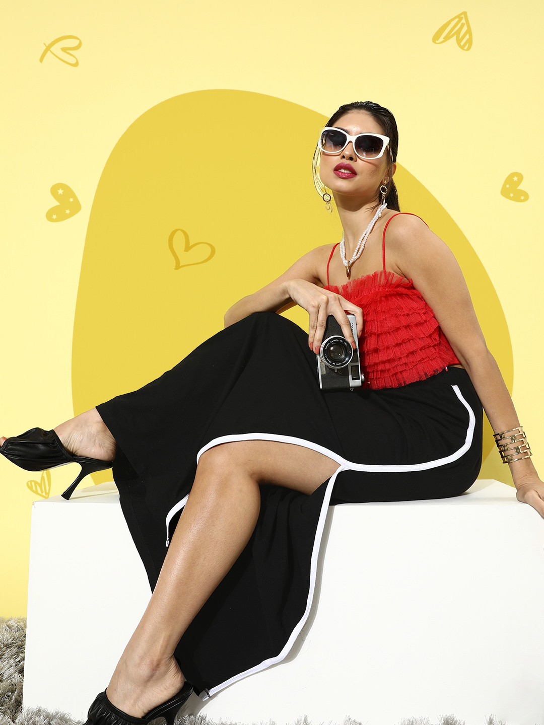 SCORPIUS Women Black Solid Peekaboo Bottom Skirt