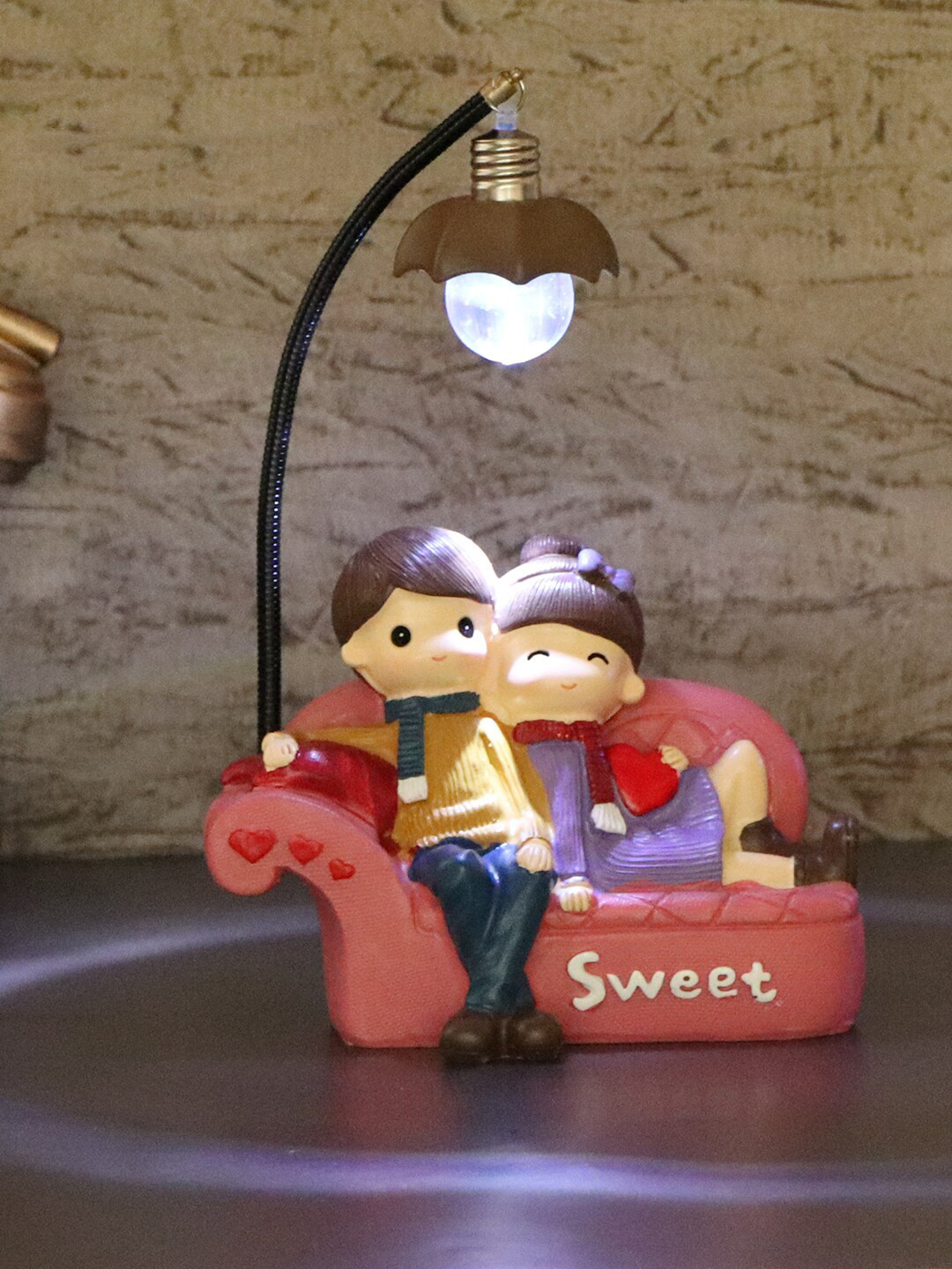 TIED RIBBONS Romantic Love Couple with Led Multicoloured Polyresin Glossy Living Room Lights Medium Showpiece - 7.1 Inches