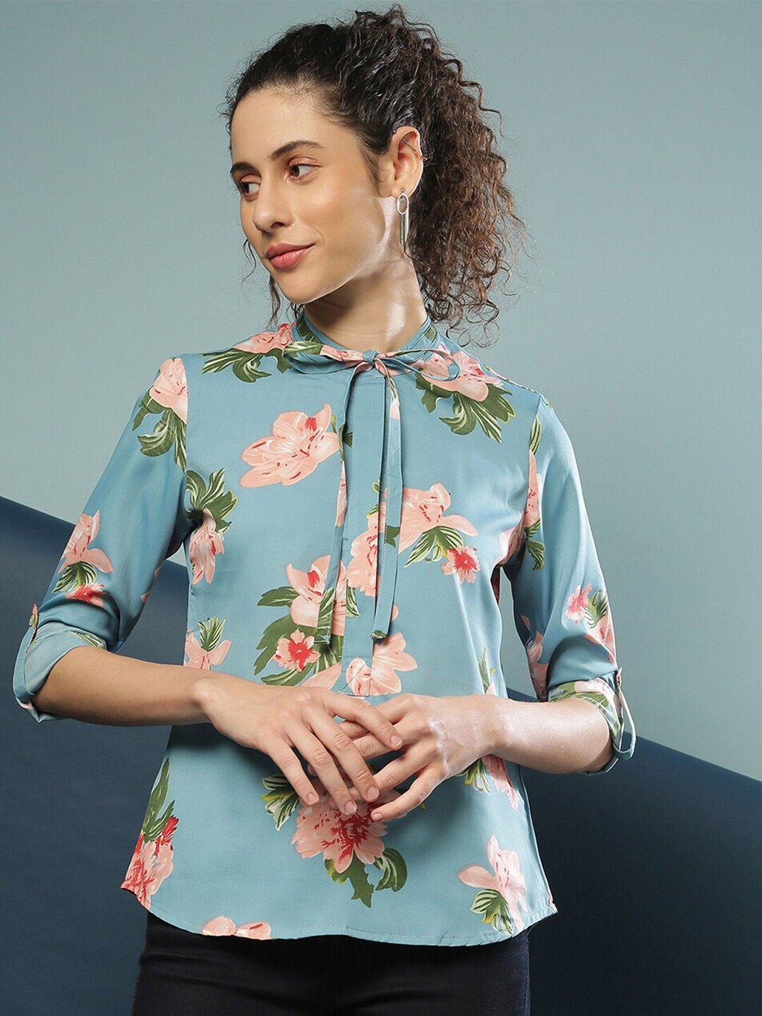 Campus Sutra Woman Blue Floral Print Tie-Up Neck High-Low Top