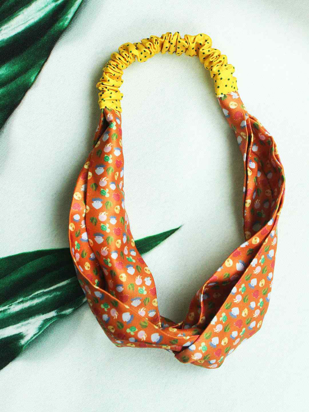 Tossido Women Orange & Yellow Aquatic Animals Printed Criss Cross Headband