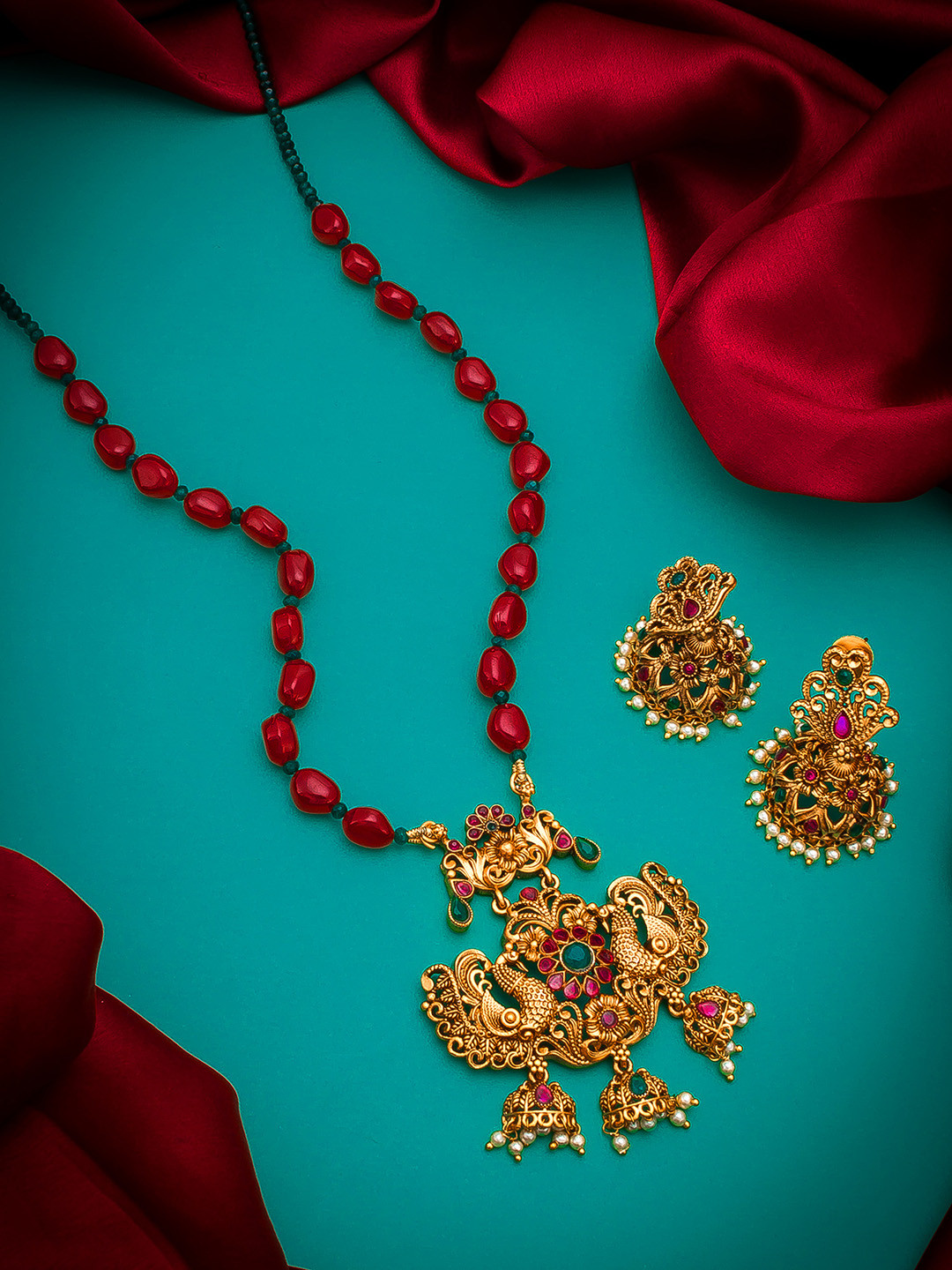 aadita Women Gold Toned & Red Peacock Pearl Jewellery Set