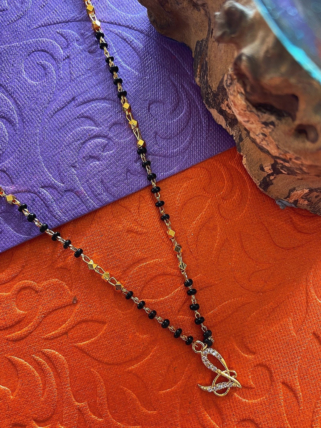 Digital Dress Room Gold-Plated & Black Beaded V Letter Mangalsutra