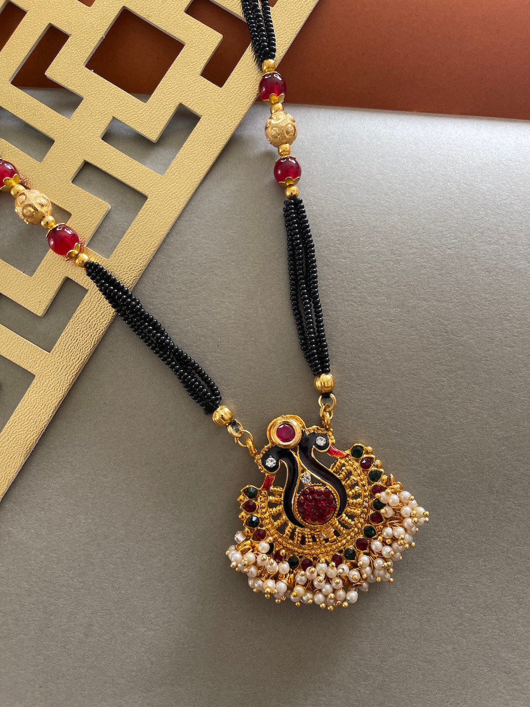 Digital Dress Room Gold-Plated Red & Green Stone Studded Mangalsutra
