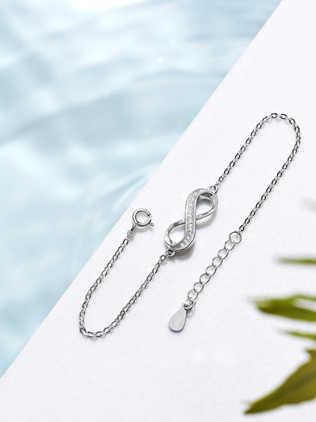 Zavya Women 925 Sterling Silver Cubic Zirconia Rhodium-Plated Charm Bracelet