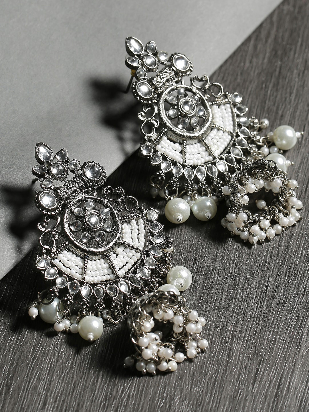 SOHI White & Silver-Toned Oxidised Kundan Jhumka Earrings