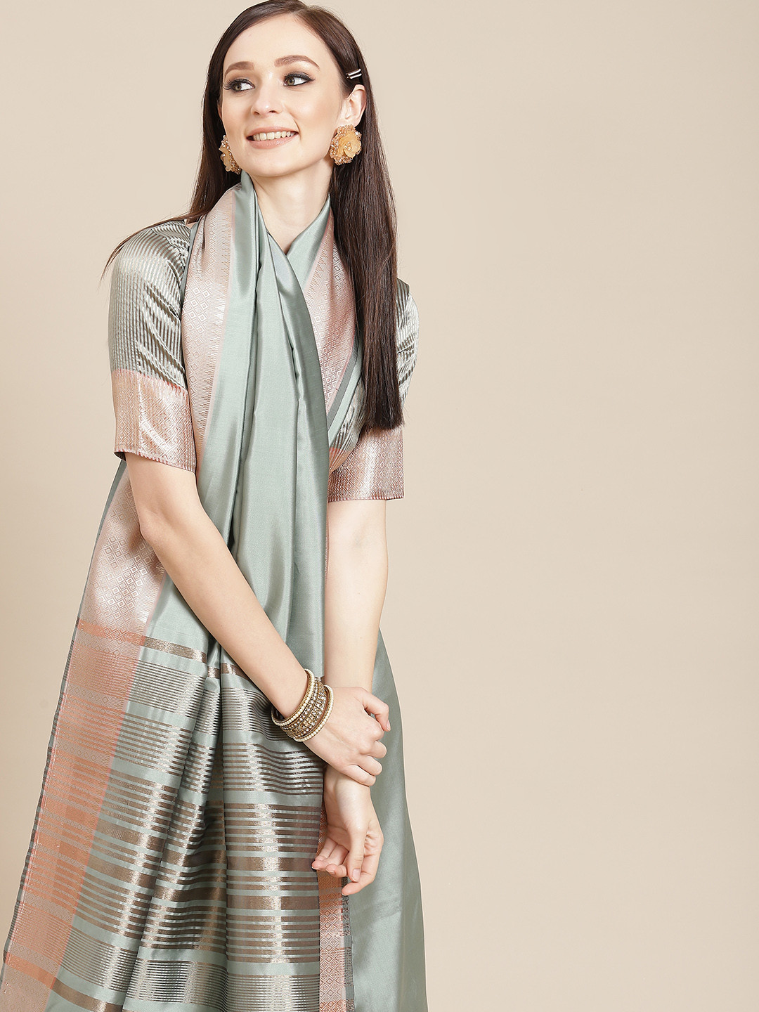 KALINI Women Pastel Green & Golden Solid Saree